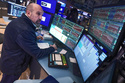 Specialist James Denaro works at his post on the floor of the New York Stock Exchange, Tuesday, Feb. 10, 2026. (AP Photo/Richard Drew)