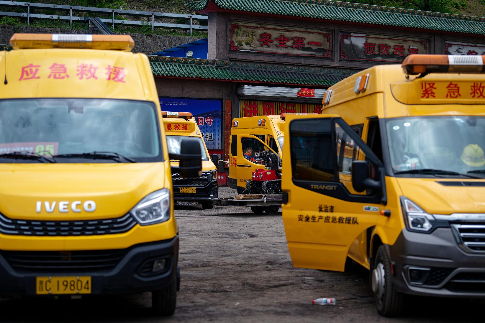 In this photo released by Xinhua News Agency, Emergency vehicle are on standby at a coal mine as rescuers conducting search and rescue operation following a gas explosion at the Liushenyu coal mine facility in Qinyuan county in Changzhi, northern China's Shanxi province on Sunday, May 24, 2026. (Zhang Xiaoyu/Xinhua via AP)