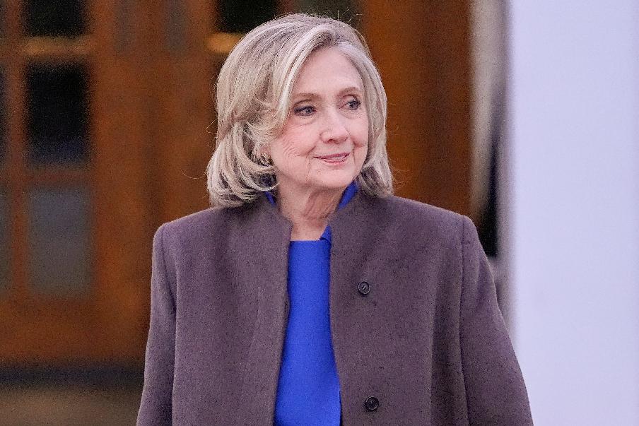 FILE - Former Secretary of State Hillary Clinton walks outside the Chappaqua Performing Arts Center, after testifying before U.S. House lawmakers as part of a congressional investigation into convicted sex offender Jeffrey Epstein, Thursday, Feb. 26, 2026, in Chappaqua, N.Y. (AP Photo/Yuki Iwamura, File)