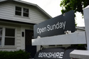 Information sign about open house for home sale is seen outside of a home in Wheeling, Ill., Monday, June 8, 2026. (AP Photo/Nam Y. Huh)