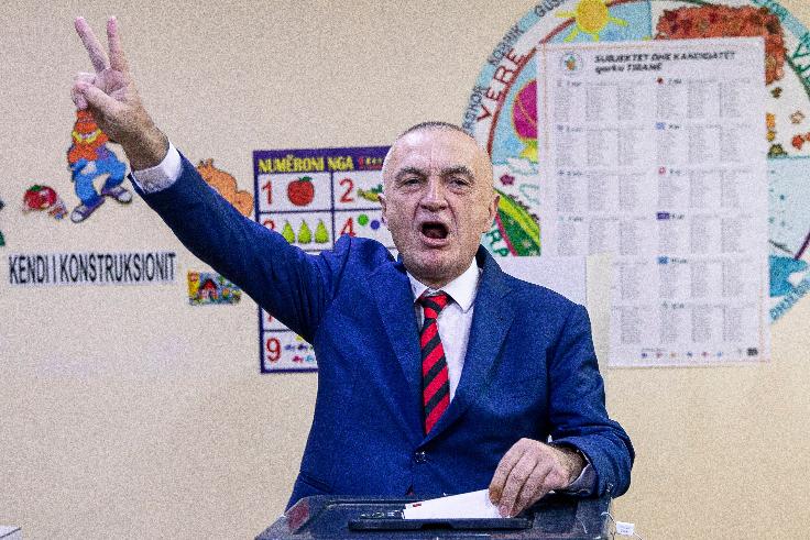 FILE - The then Albanian president Ilir Meta flashes victory sign as he casts his vote during parliamentary elections in capital Tirana, Albania on Sunday, April 25, 2021. (AP Photo/Visar Kryeziu, File)