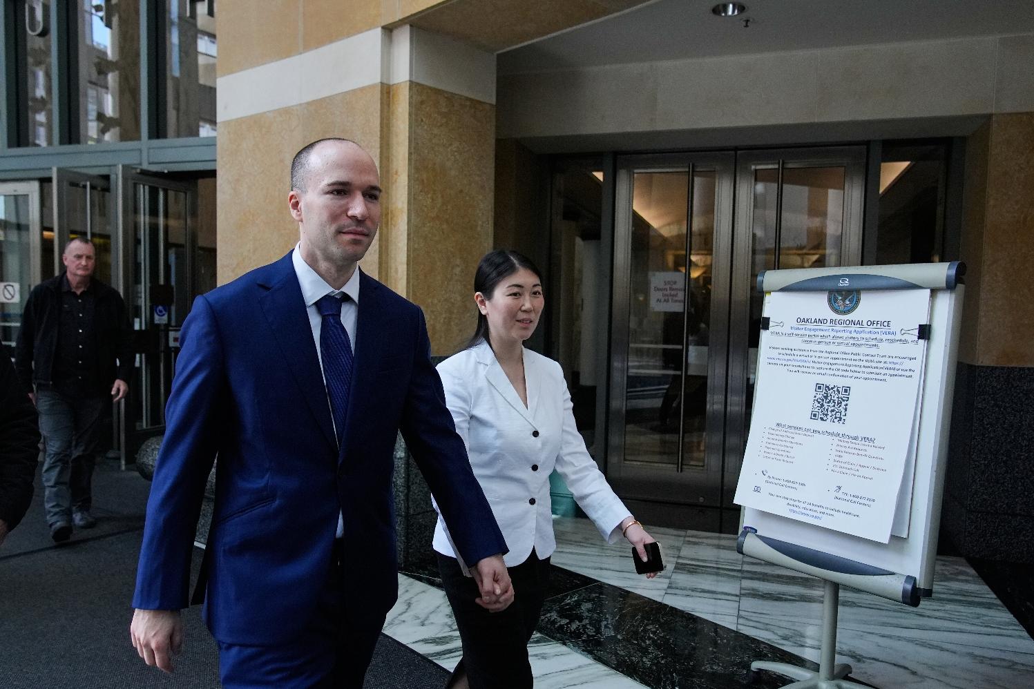OpenAI president Greg Brockman, second left, exits the U.S. District Court, in Oakland, Calif., Thursday, April 30, 2026. (AP Photo/Godofredo A. Vásquez)