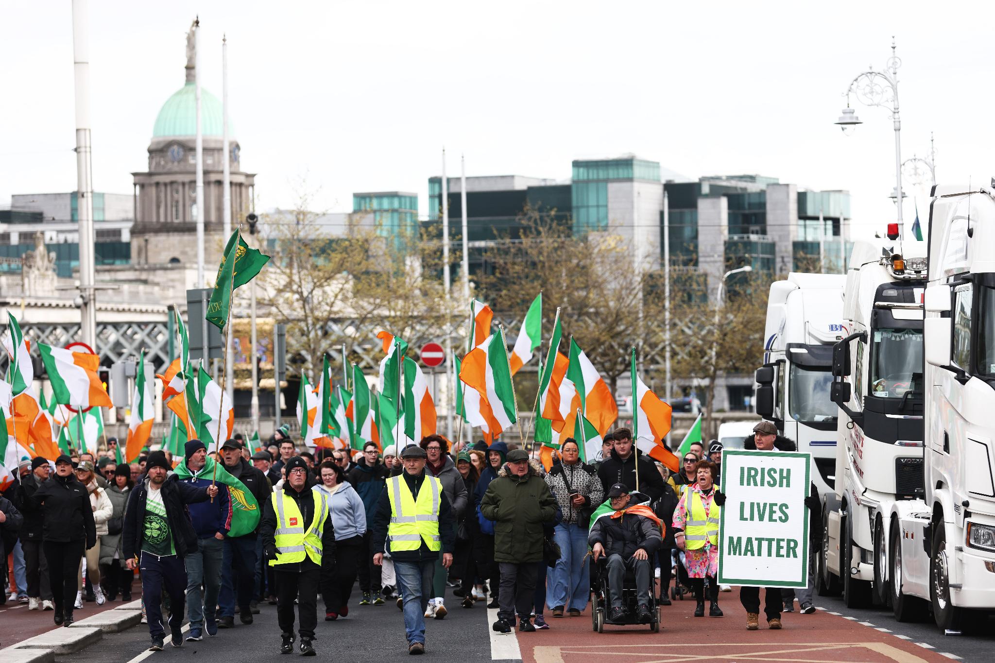 Protesters make their way to O'Connell Street during the fifth day of a National Fuel Protest, in Dublin, Ireland, Saturday, April 11, 2026. (AP Photo/Peter Morrison)
