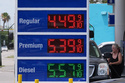 Gas prices are displayed at a Marathon gas station in Miami, Tuesday, May 12, 2026. (AP Photo/Marta Lavandier)