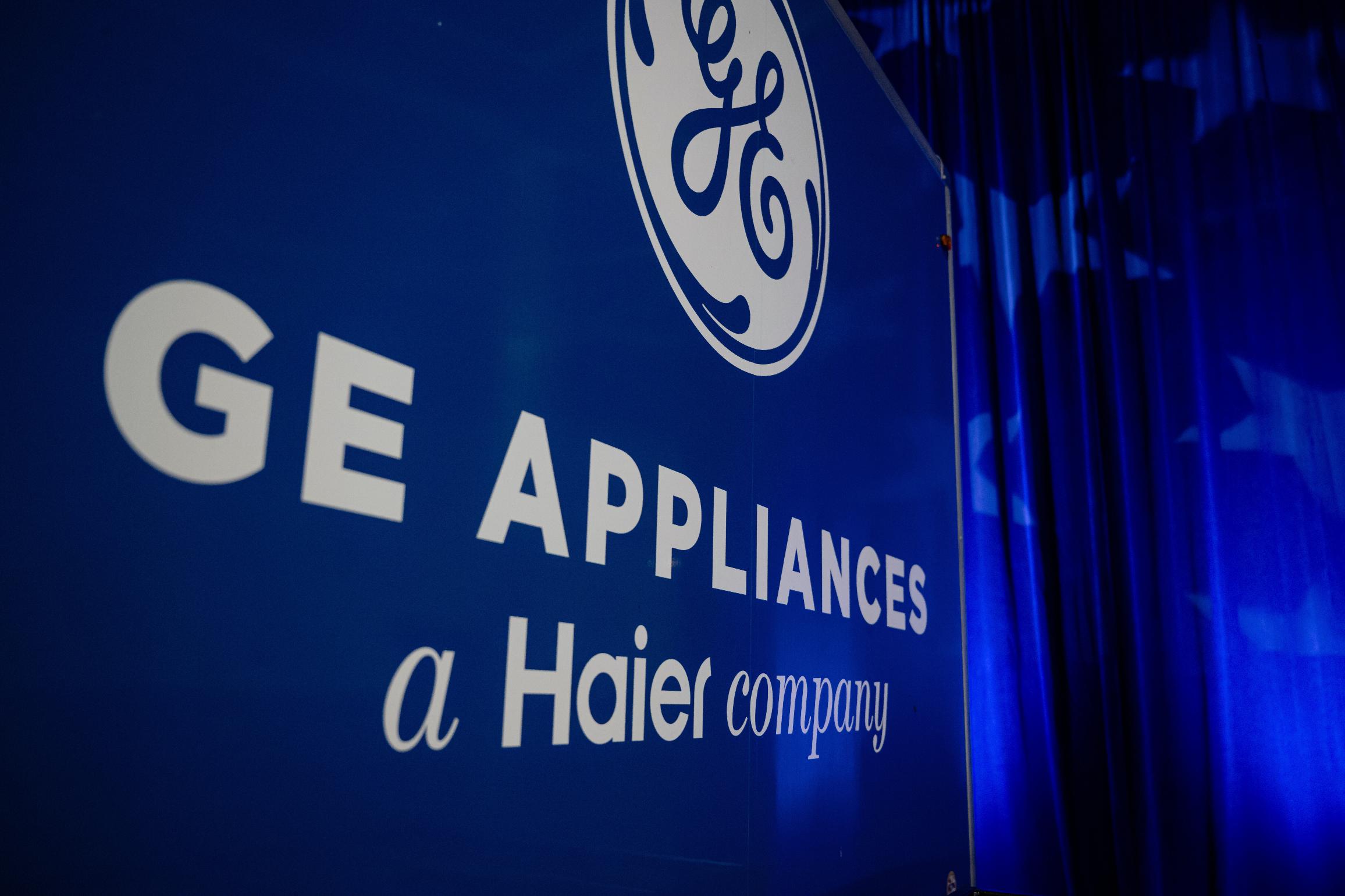 FILE - A trailer with the GE logo is seen at a stage area at GE Appliances global headquarters, Aug 13, 2025, in Louisville, Ky. (AP Photo/Jon Cherry, file)