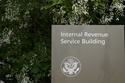 FILE - A sign for the Internal Revenue Service building is pictured in Washington, May 4, 2021. (AP Photo/Patrick Semansky, File)