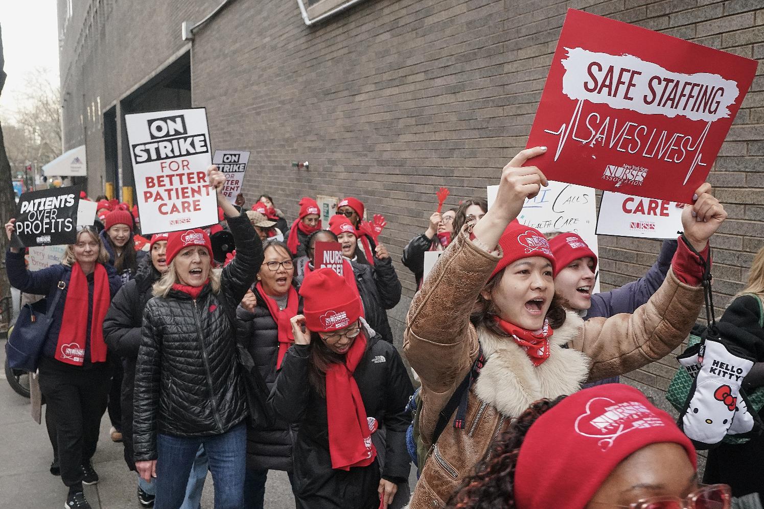 Striking nurses demonstrate outside Mt. Sinai Hospital, in New York, Wednesday, Jan. 14, 2026. (AP Photo/Richard Drew)