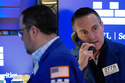 Michael Gagliano works on the floor at the New York Stock Exchange in New York, Friday, March 6, 2026. (AP Photo/Seth Wenig)