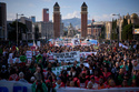 FILE - People gather during a demonstration to protest high housing costs in Barcelona, Spain, April 5, 2025. (AP Photo/Emilio Morenatti, File)
