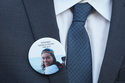 FILE - A family member wears a photo of a Boeing crash victim Danielle Moore before a hearing at federal court in Fort Worth, Texas, Sept. 3, 2025. (AP Photo/LM Otero, File)