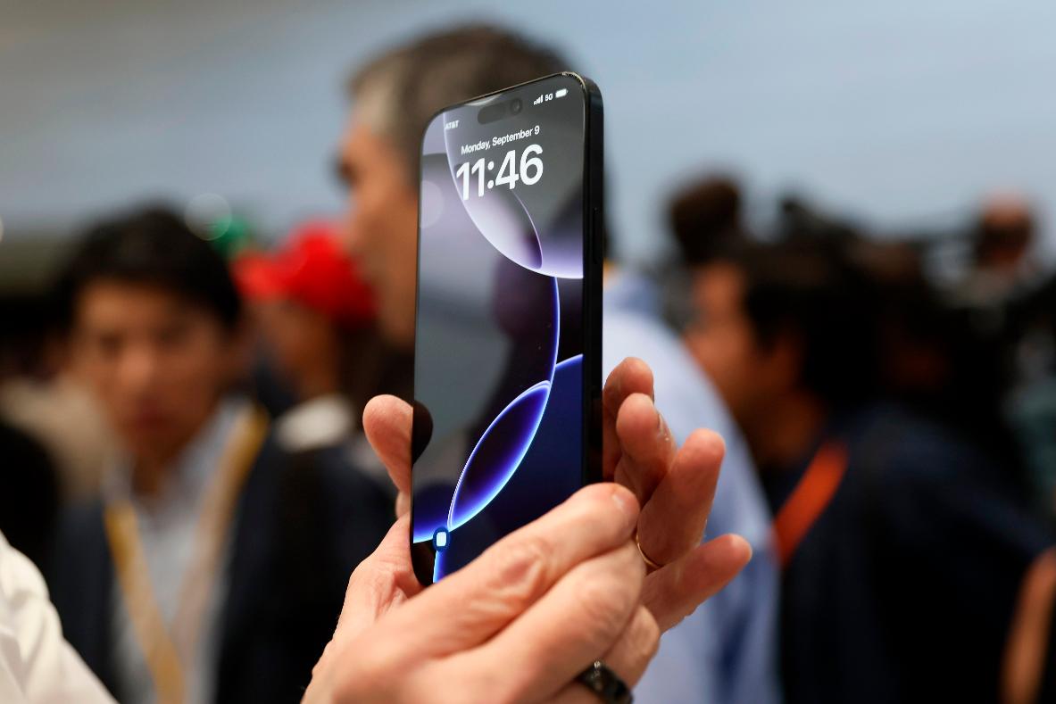 FILE - The new iPhone 16 is displayed during an announcement of new products at Apple headquarters Sept. 9, 2024, in Cupertino, Calif. (AP Photo/Juliana Yamada, File)
