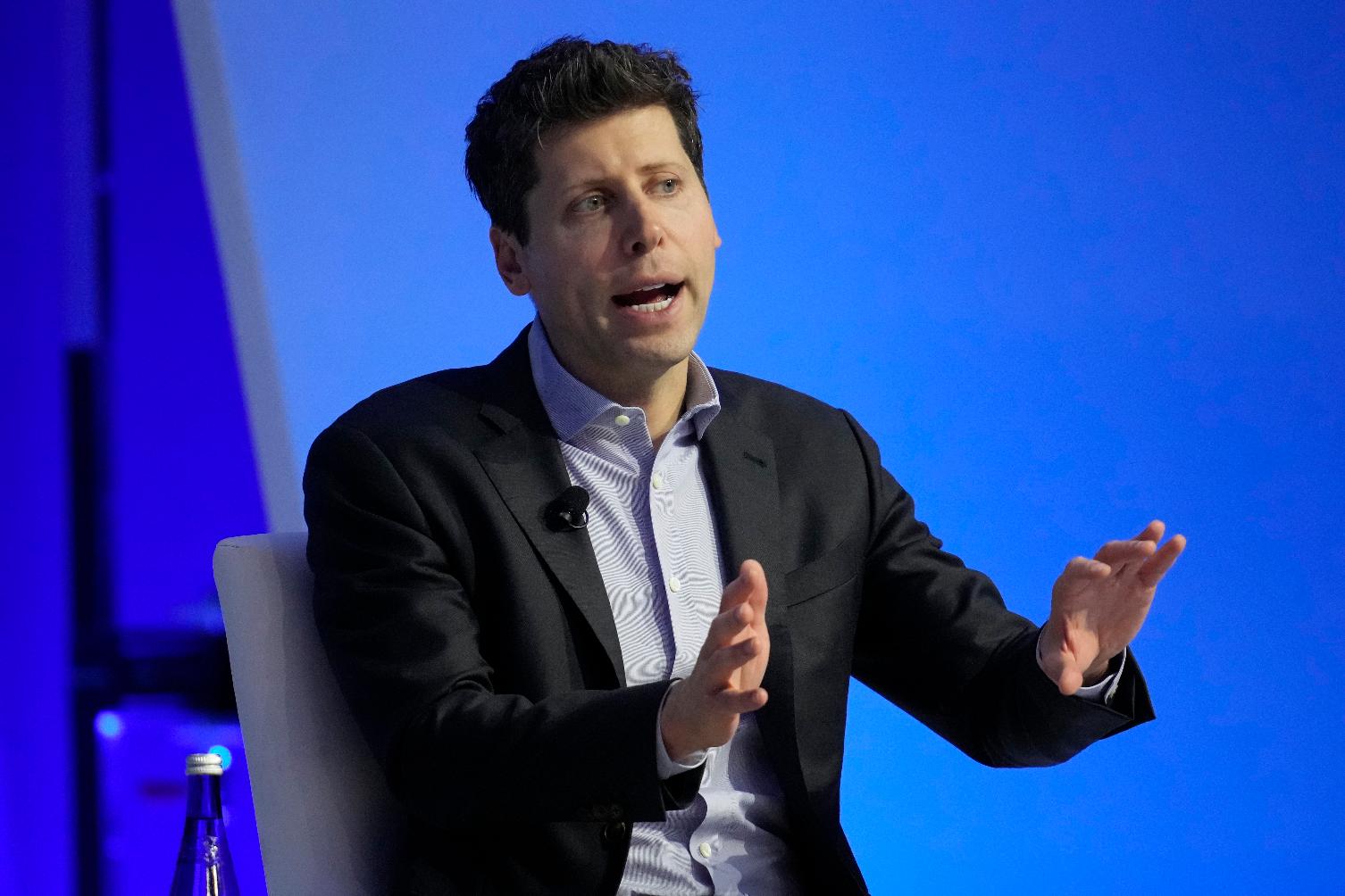 File - Sam Altman participates in a discussion during the Asia-Pacific Economic Cooperation (APEC) CEO Summit, Thursday, Nov. 16, 2023, in San Francisco. Microsoft has announced that it's hired Sam Altman and another architect of ChatGPT maker OpenAI after they unexpectedly departed the company days earlier in a corporate shakeup that shocked the artificial intelligence world. Microsoft Chairman and CEO Satya Nadella also tweeted Monday, Nov. 20, 2023 that the major investor in the chatbot that kicked off the generative AI craze is committed to its partnership with OpenAI. (AP Photo/Eric Risberg, File)