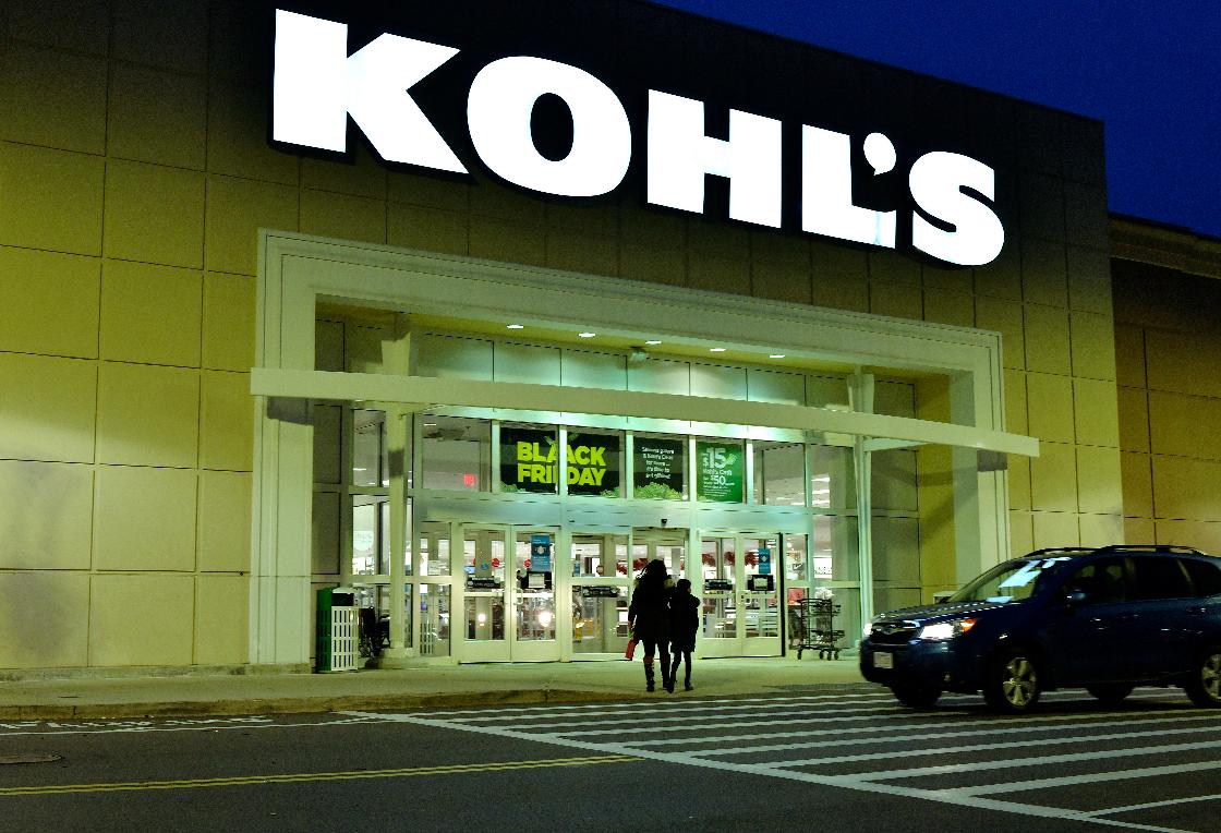 FILE - A pair of shoppers arrive at a Kohl's, Nov. 26, 2021, in Everett, Mass. (AP Photo/Josh Reynolds, file)