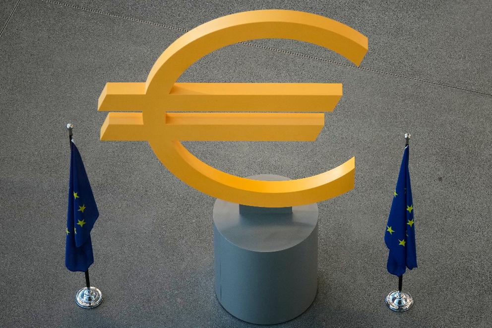 FILE -The Euro currency symbol is seen prior to a press conference after an ECB's governing council meeting in Frankfurt, Germany, Dec. 18, 2025. (AP Photo/Michael Probst, File)