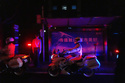 Motorcycle escorts and security travel in the motorcade with President Donald Trump Wednesday, May 13, 2026, in Beijing. (AP Photo/Mark Schiefelbein)