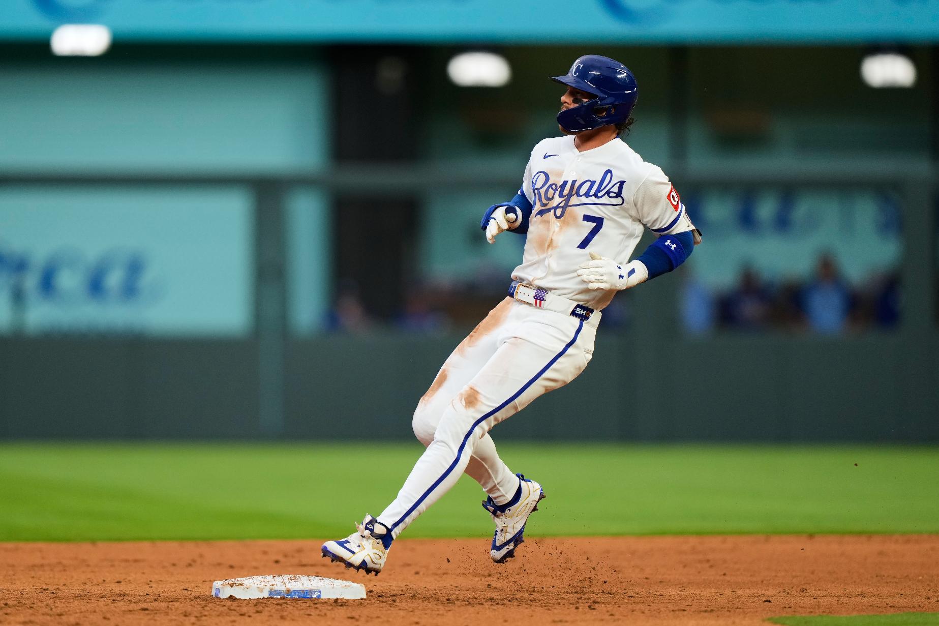 Kansas City Royals shortstop Bobby Witt Jr. runs to second after hitting a double during the third inning of a baseball game against the Chicago White Sox, Thursday, April 9, 2026, in Kansas City, Mo. (AP Photo/Charlie Riedel)