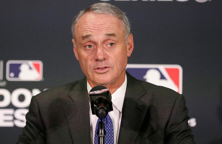 FILE - Major League Baseball commissioner Rob Manfred speaks during a news conference, June 29, 2019, in London. (AP Photo/Tim Ireland, file)