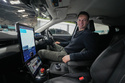 Britain Robotaxis Alex Kendall, co-founder and CEO of Wayve, sits in the autonomous vehicle during an interview in London, Monday, Feb. 9, 2026. (AP Photo/Kin Cheung)