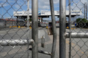 An entrance to the Balboa terminal, run by CK Hutchison's Panama Ports Co., is closed after Panama government ordered the occupation of the port following a Supreme Court ruling that the concession was unconstitutional in Panama City, Monday, Feb. 23, 2026. (AP Photo/Matias Delacroix)