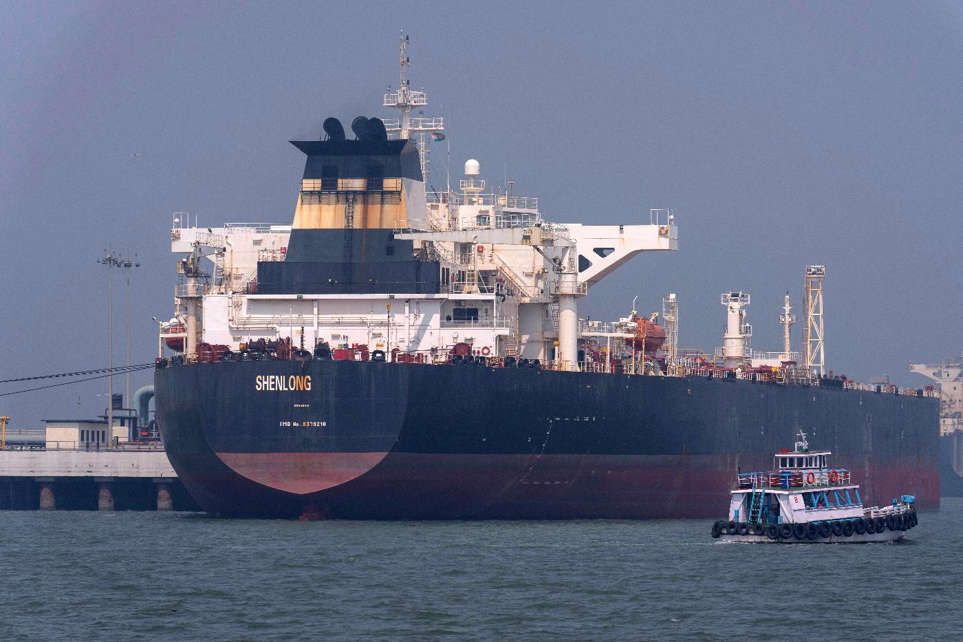 FILE - Liberia-flagged tanker Shenlong Suezmax, carrying crude oil from Saudi Arabia, that arrived clearing the Strait of Hormuz, is seen at the Mumbai Port in Mumbai, India, Thursday, March 12, 2026. (AP Photo/Rafiq Maqbool, File)