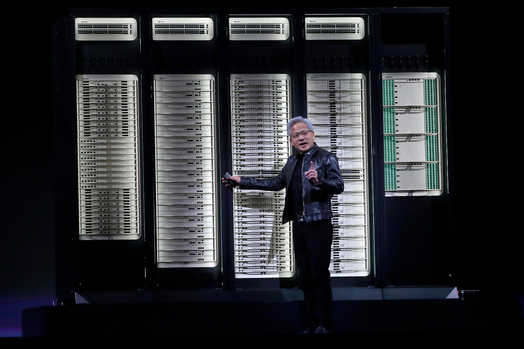 Nvidia CEO Jensen Huang delivers a speech during the Computex 2026 exhibition in Taipei, Taiwan, Monday, June 1, 2026. (AP Photo/Chiang Ying-ying)