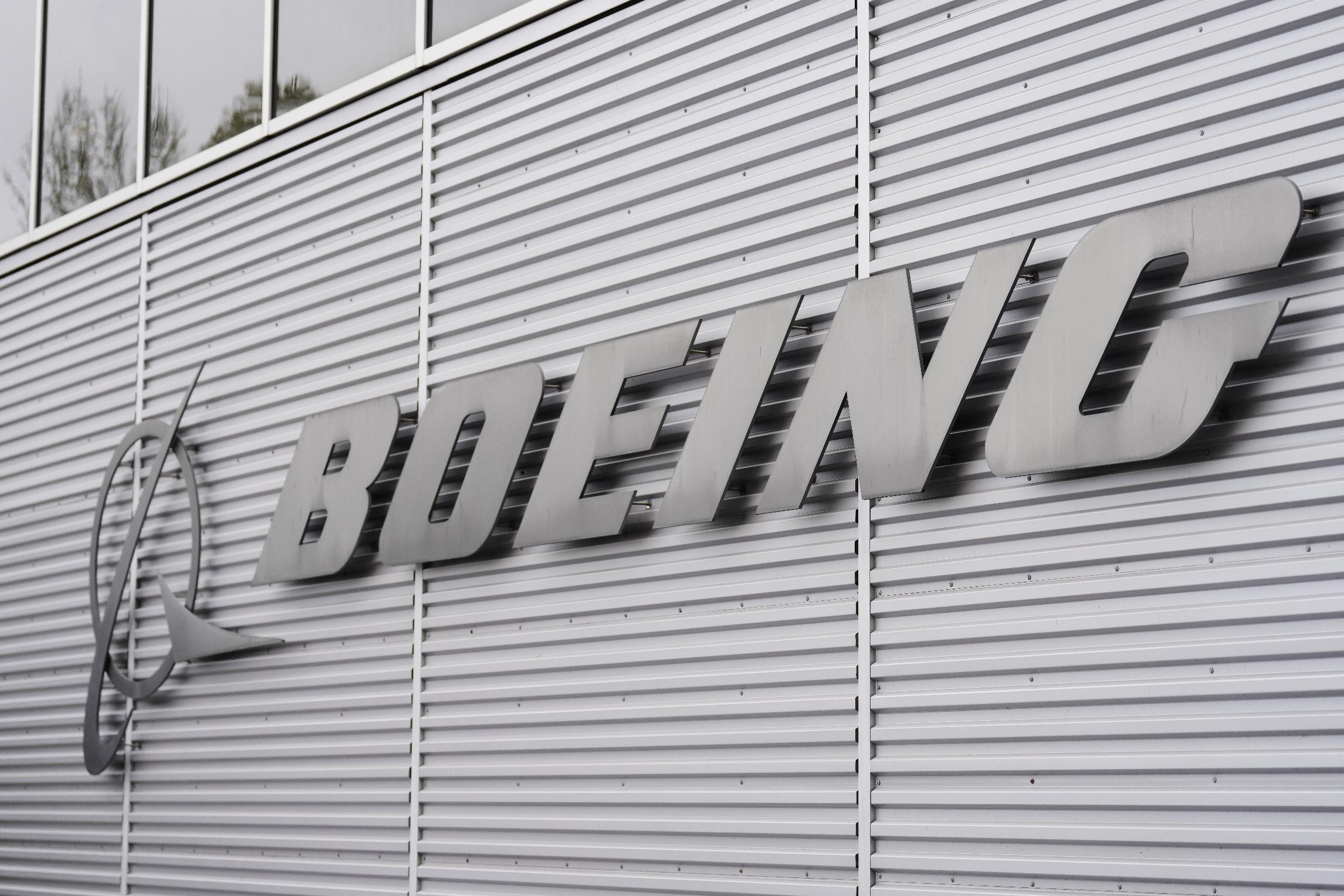 FILE - The Boeing logo is seen outside of Boeing's factory Wednesday, April 15, 2026, in Renton, Wash. (AP Photo/Lindsey Wasson, file)