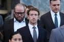 Meta CEO Mark Zuckerberg leaves after testifying in a landmark trial over whether social media platforms deliberately addict and harm children, Wednesday, Feb. 18, 2026, in Los Angeles. (AP Photo/Damian Dovarganes)