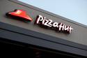 FILE - This Dec. 15, 2016, file photo shows a Pizza Hut restaurant in New Orleans. (AP Photo/Gerald Herbert, File)