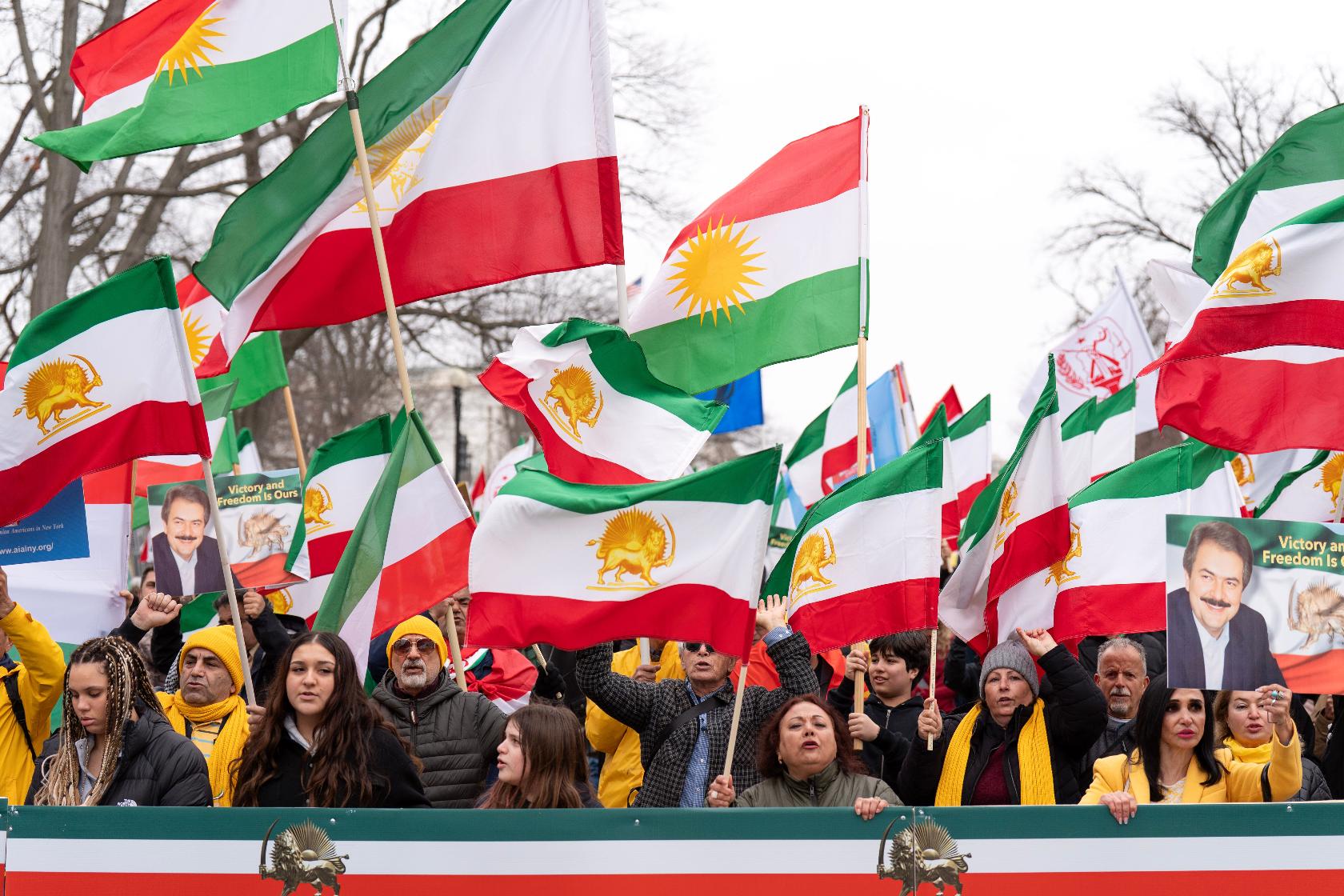 Supporters of Iranian democracy and the overthrow of the regime march down Pennsylvania Avenue on Saturday March 7, 2026, in Washington. (AP Photo/Jose Luis Magana)