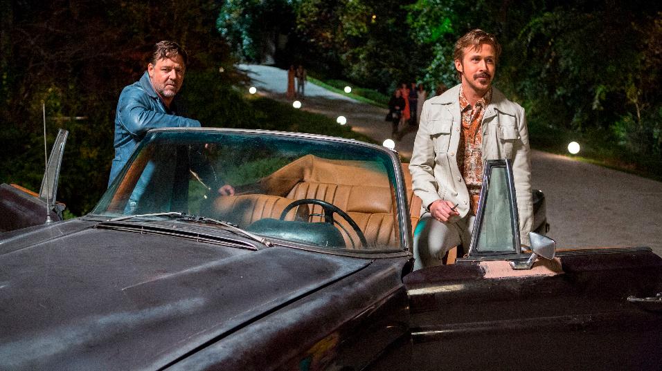 This image released by Warner Bros. shows Russell Crowe, left, and Ryan Gosling in a scene from "The Nice Guys." (Daniel McFadden/Warner Bros. via AP)