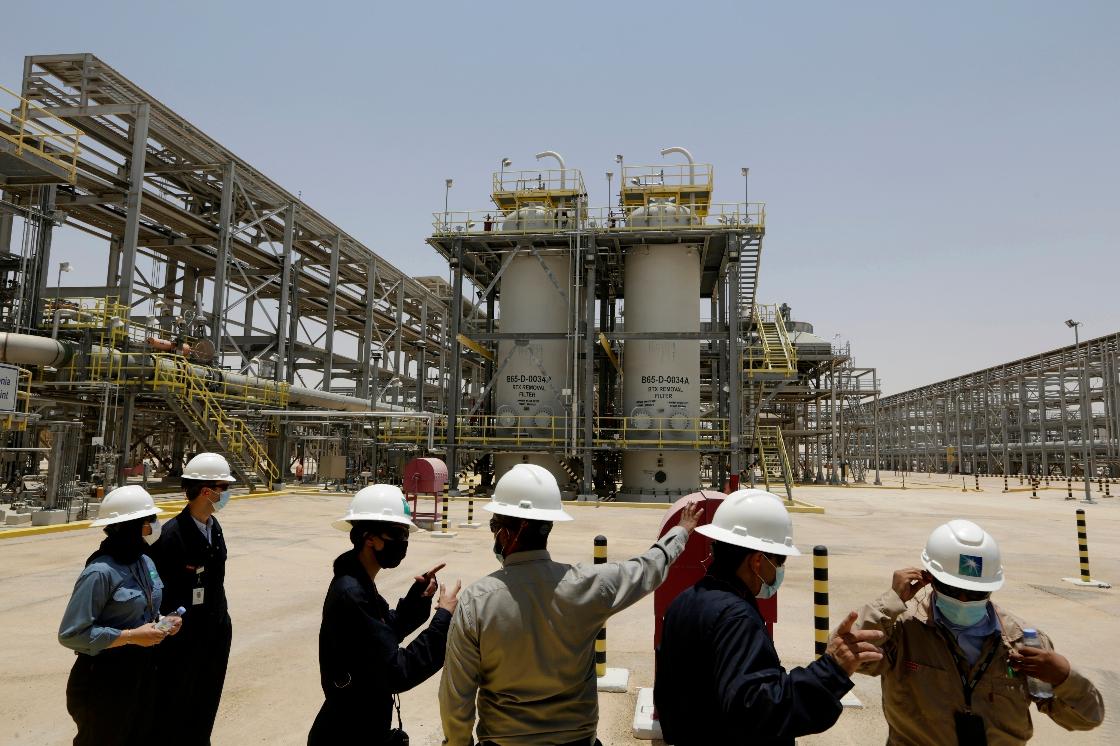 FILE - Saudi Aramco engineers and journalists look at the Hawiyah Natural Gas Liquids Recovery Plant in Hawiyah, in the Eastern Province of Saudi Arabia on June 28, 2021. (AP Photo/Amr Nabil, File)