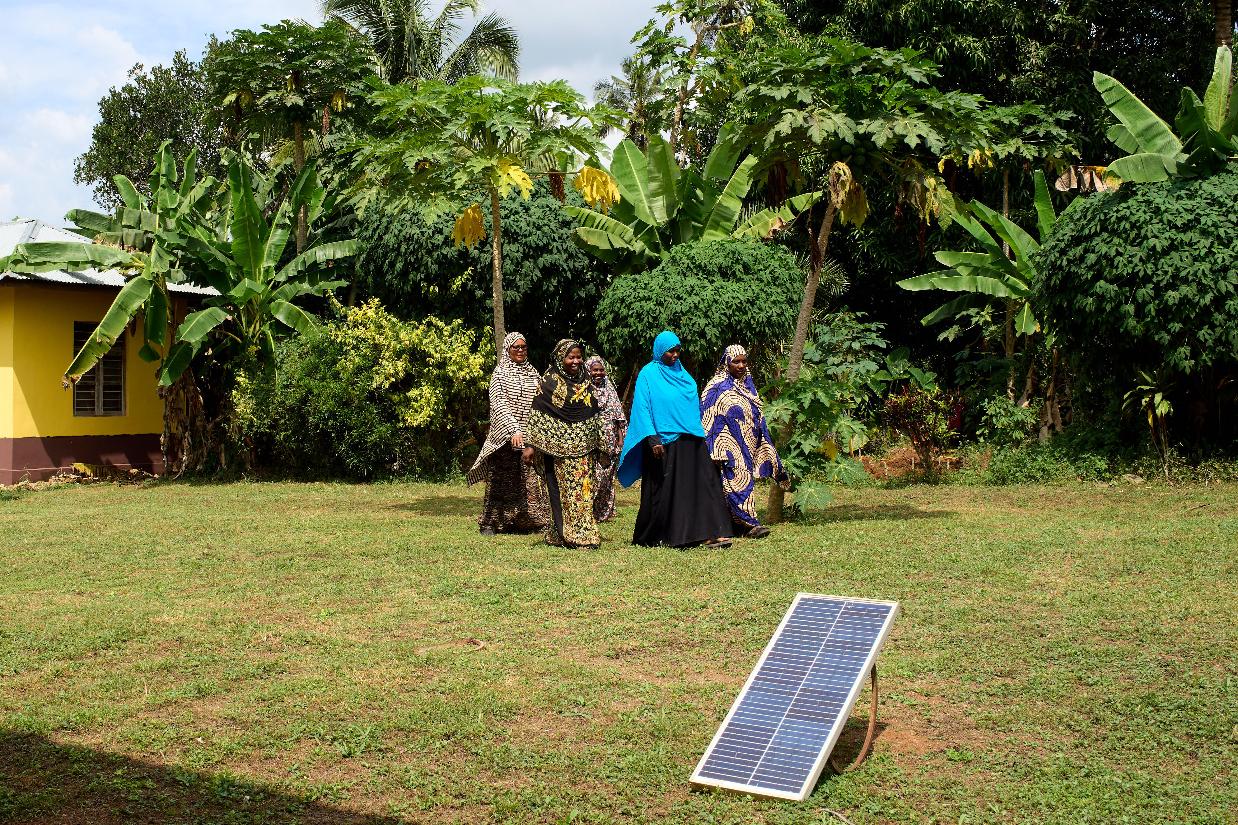 "Solar Mama" technicians walk on the campus of Barefoot College International in Kinyasini, Unguja, Zanzibar, July 23, 2025. (AP Photo/Jack Denton)