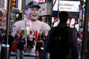 A large inflatable figure depicting Elon Musk stands in Times Square in New York on Thursday, June 11, 2026. (AP Photo/Seth Wenig)