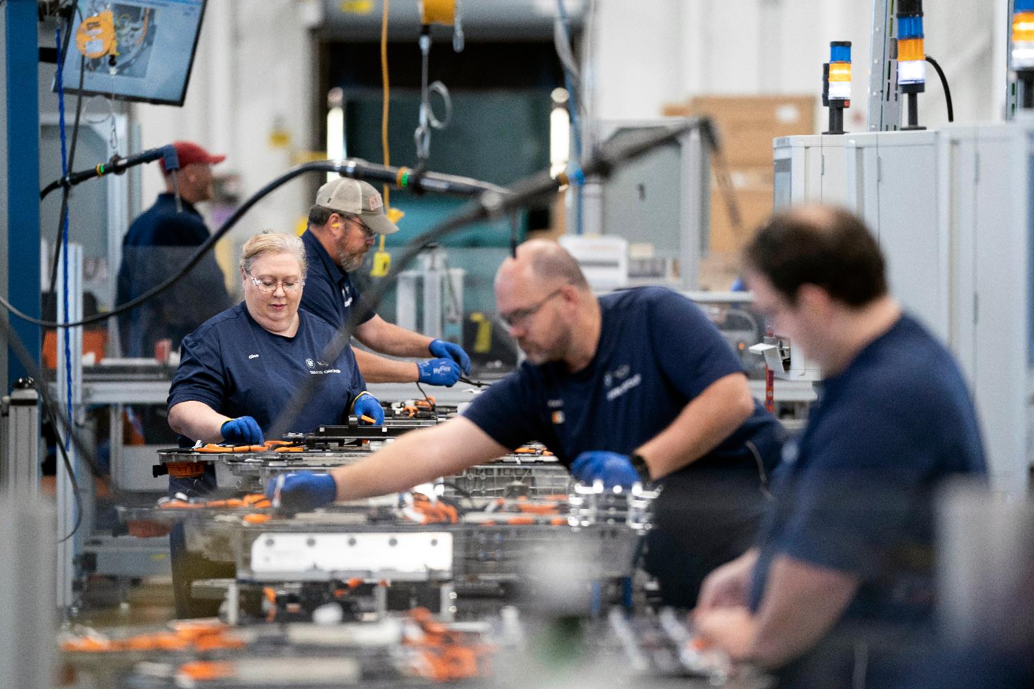 FILE - Employees work in the battery assembly hall at the BMW Spartanburg plant in Greer, S.C. on Oct. 19, 2022. (AP Photo/Sean Rayford, File)