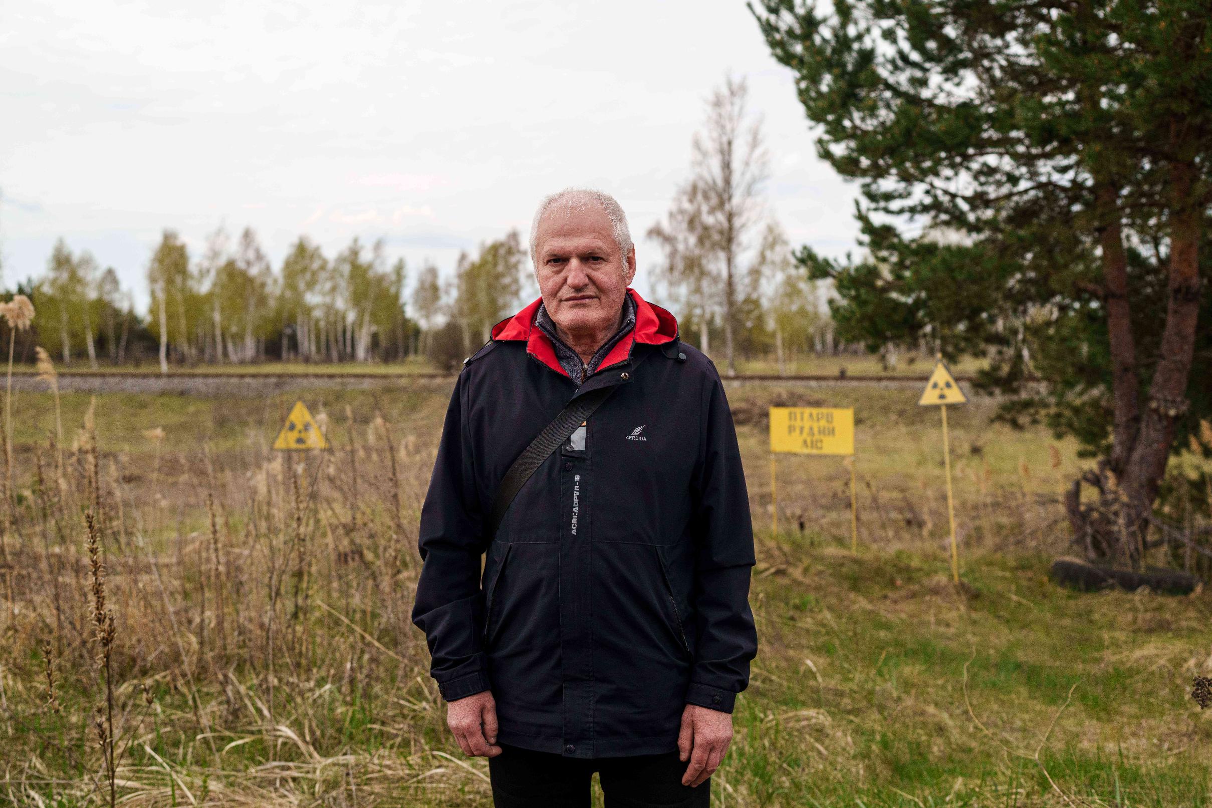 Viktor Hluhovtsov, 66, one of the workers sent to help clean up contamination from the Chernobyl nuclear power plant accident, poses for a portrait near the plant in Chernobyl, Ukraine, Tuesday, April 21, 2026. (AP Photo/Evgeniy Maloletka)