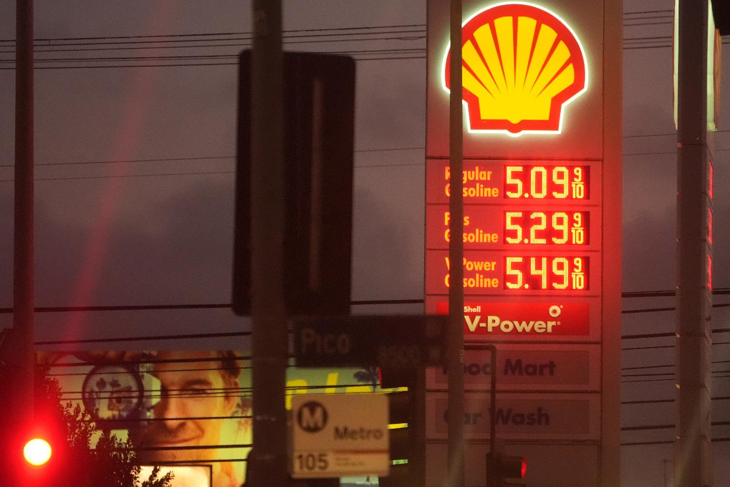 Gas prices are displayed, Monday, March 9, 2026, in Los Angeles. (AP Photo/Damian Dovarganes)