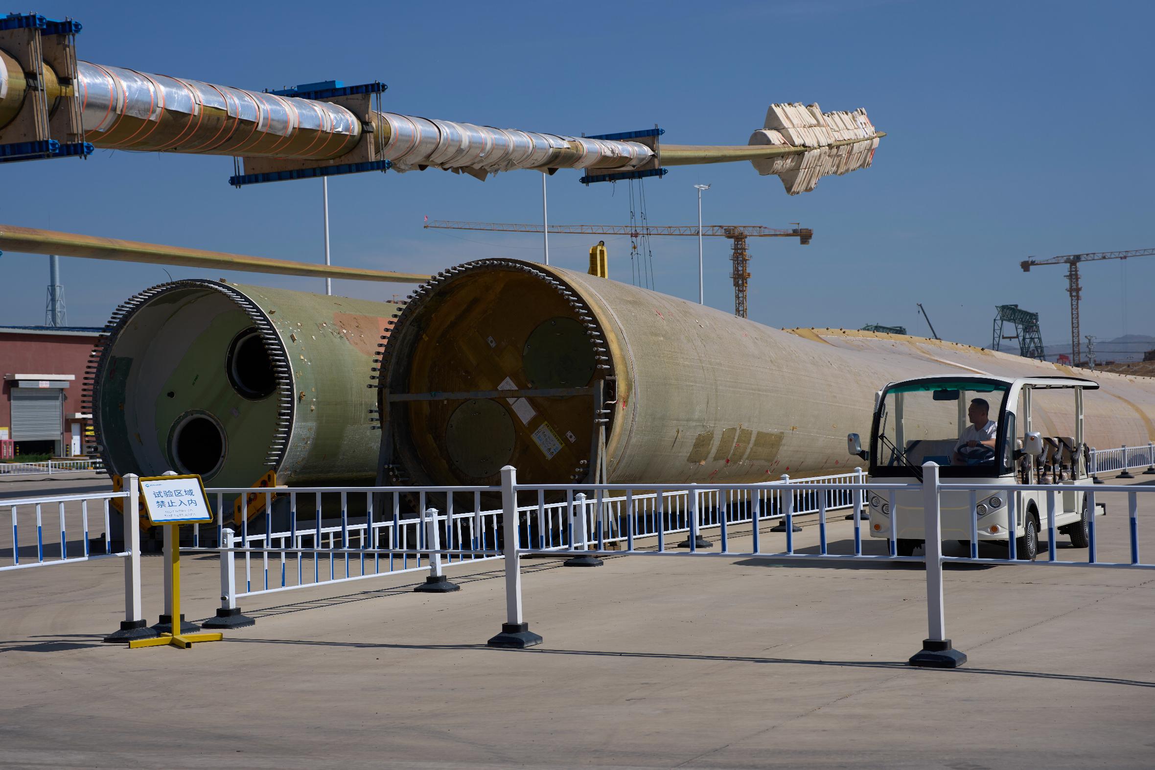 Wind turbine blades are stress tested at the Mingyang North Smart Energy factory in Baotou in northern China's Inner Mongolia province on Saturday, June 13, 2026. (AP Photo/Ng Han Guan)