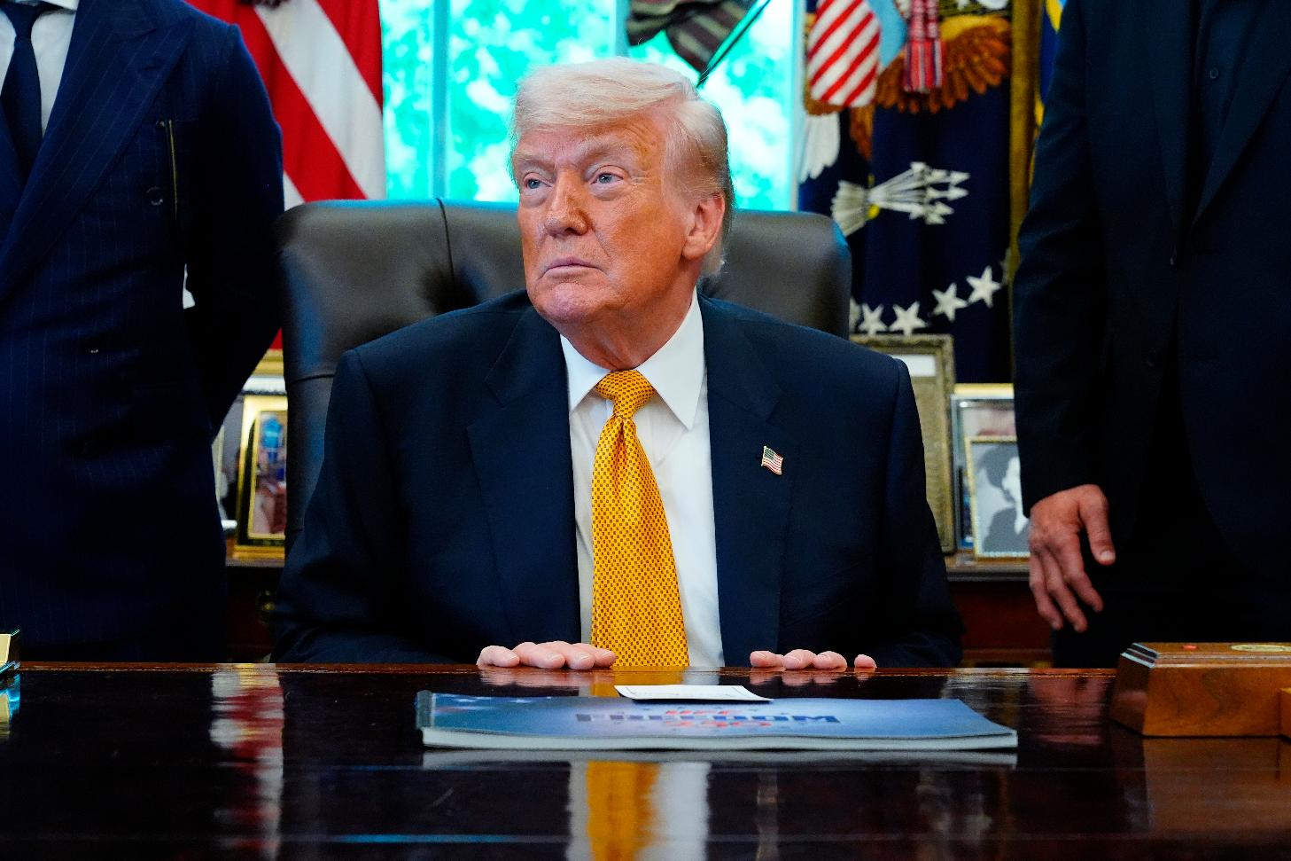 President Donald Trump meets with UFC fighters, Wednesday, May 6, 2026, in the Oval Office of the White House, in Washington. (AP Photo/Jacquelyn Martin)