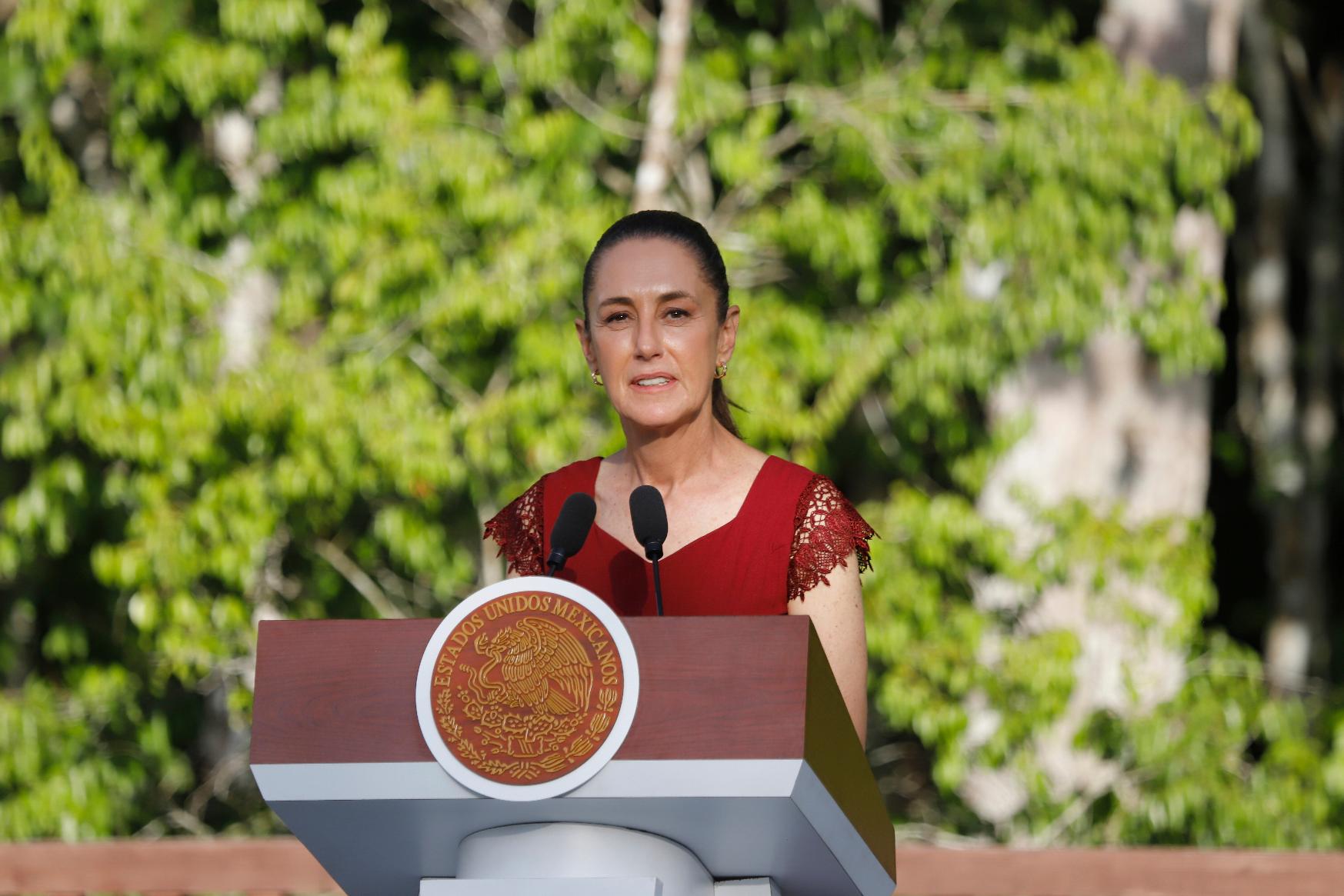 Mexican President Claudia Sheinbaum talks to reporters during a joint press conference, in Calakmul, Campeche state, Mexico, Friday, Aug. 15, 2025. (AP Photo/Martin Zetina)