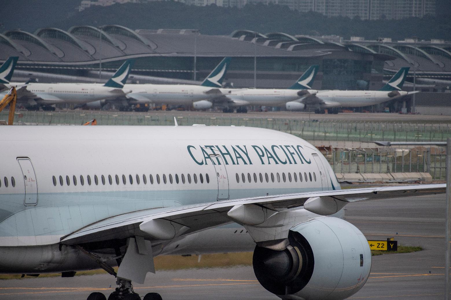 FILE - A Cathay Pacific airplane taxis at Hong Kong International Airport in Hong Kong on Nov. 25, 2022. (AP Photo/Vernon Yuen, File)