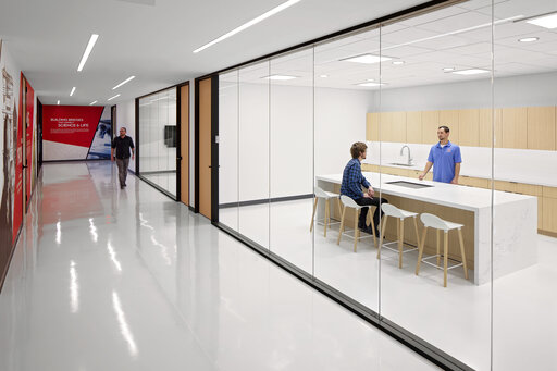 This undated photo provided by Ajinomoto Health &amp; Nutrition shows the conference and work space at Ajinomoto Health &amp; Nutrition in Itasca, Ill.  Francine Yoon, a 24-year-old food scientist at Ajinomoto Health and Nutrition NA  has been working mostly in person since the pandemic, including at her current job that she started last fall. But moving in last year with her older parents, both in their early 60s, has led to some heightened level of anxiety because she's worried about passing on the virus to them. (Ajinomoto Health &amp; Nutrition via AP)