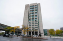 FILE - Pedestrians pass the Richard J. Daronco Westchester County Courthouse, Oct. 13, 2020, in New York. (AP Photo/Frank Franklin II, File)