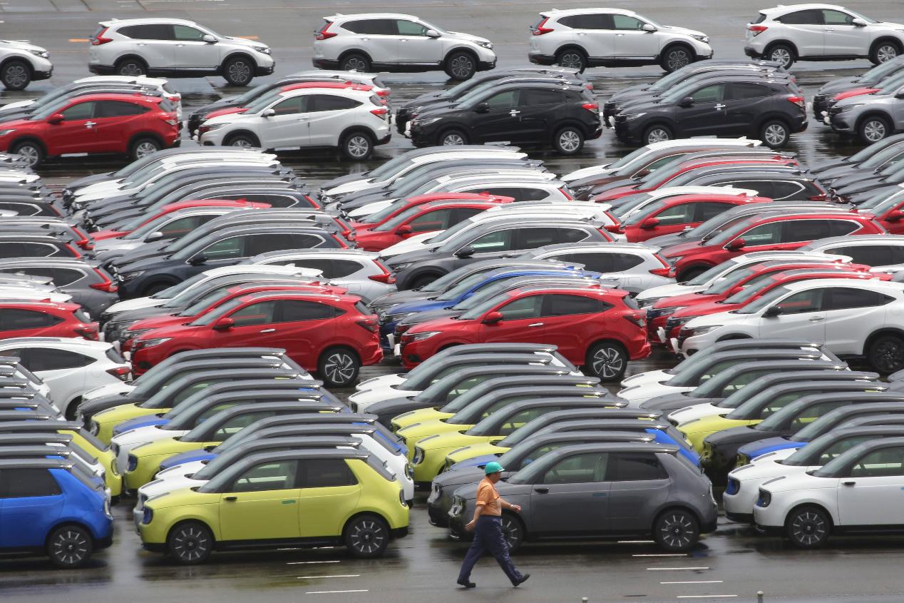 FILE - Cars for export are parked at a port in Yokohama, near Tokyo, on July 6, 2020. (AP Photo/Koji Sasahara, File)