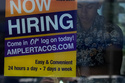 FILE - A hiring sign is displayed at a restaurant in Niles, Ill., Thursday, May 14, 2026. (AP Photo/Nam Y. Huh, File)