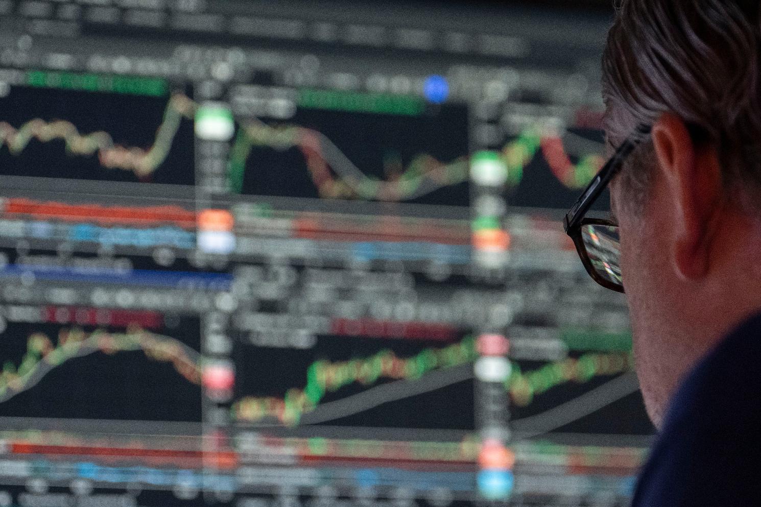 Specialist Gregg Maloney works on the floor of the New York Stock Exchange, Friday, Aug. 7, 2026, in New York. (AP Photo/Yuki Iwamura)