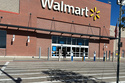 FILE - A shopper heads into a Walmart store Thursday, Oct. 16, 2025, in Englewood, Colo. (AP Photo/David Zalubowski, File)