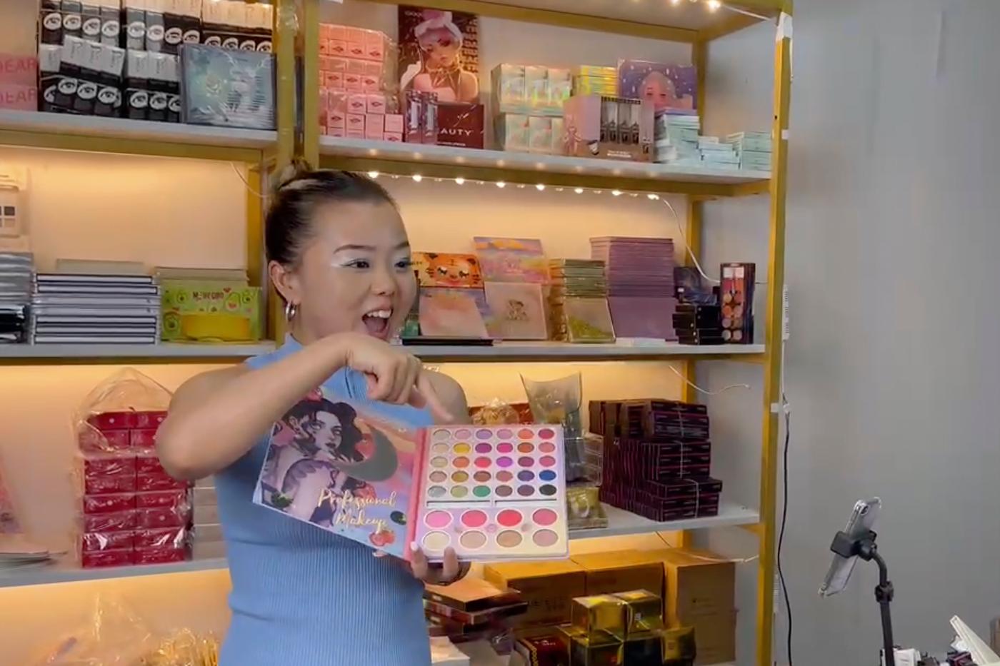 In this photo released by Yan Guanghua, Yan Guanghua, one of TikTok earliest livestreamers in China, conducts a livestream from her studio in Shenzhen in southern China's Guangdong province in July 2023. Chinese livestreamers have set their sights on TikTok shoppers in the U.S. and Europe, hawking everything from bags and apparel to crystals with eyes on a potentially lucrative market, despite uncertainties over the Chinese social media platform's future in the U.S. and elsewhere. (Yan Guanghua via AP)