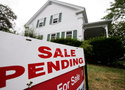 FILE - In this July 26, 2011 photo, a sale pending sign is posted outside a house in Bath, Maine. (AP Photo/Pat Wellenbach, File)